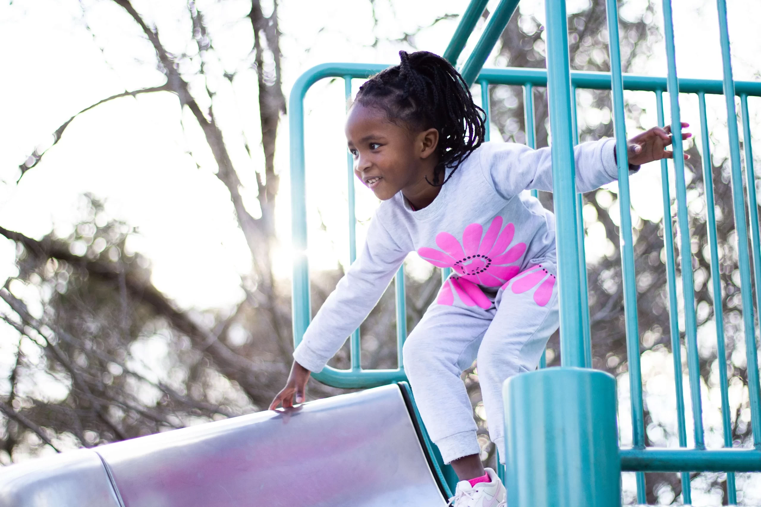 about aftercare South Africa girl on jungle gym